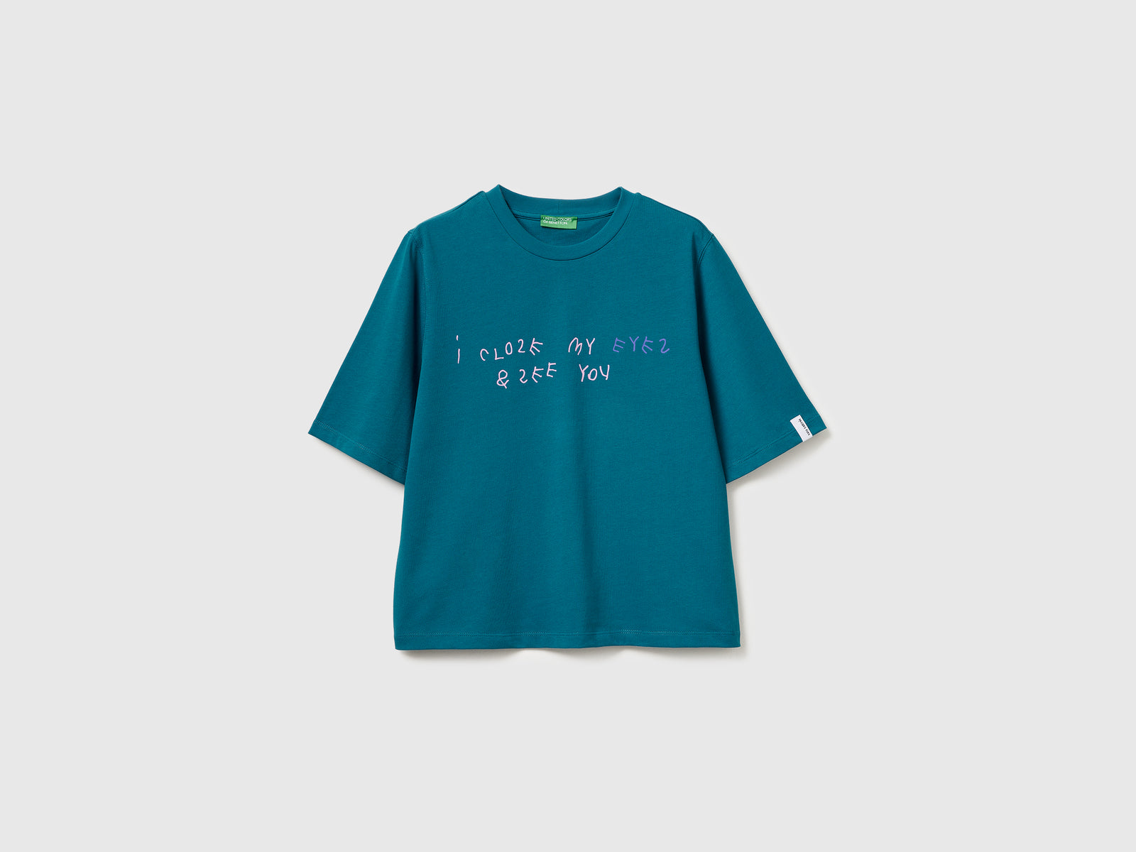 Teal t-shirt with Coco Capitán print