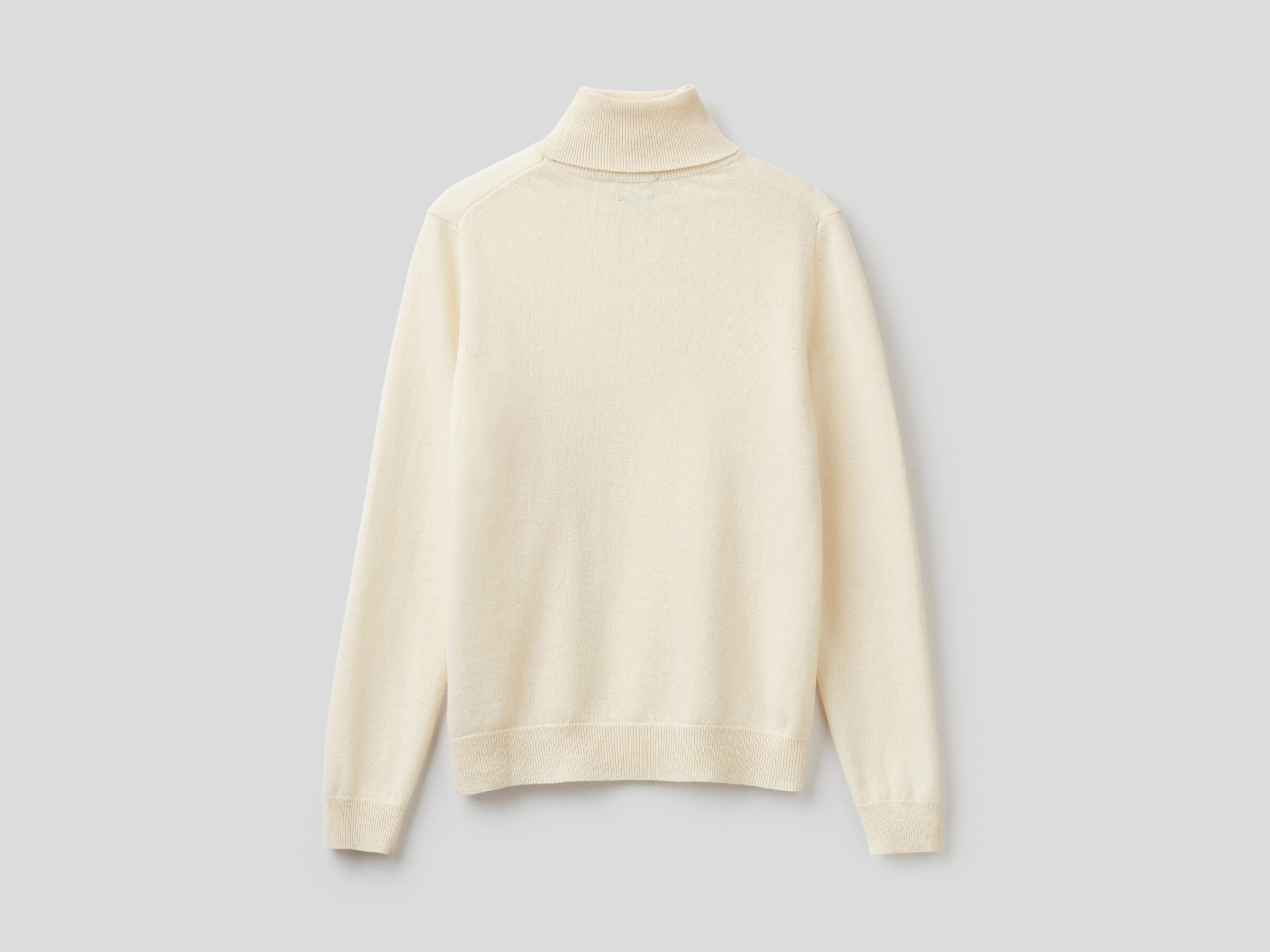 Cream turtleneck sweater in pure virgin wool