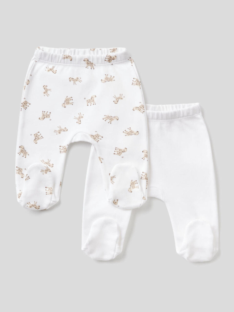 Two pairs of stirrup trousers in organic cotton image number 1