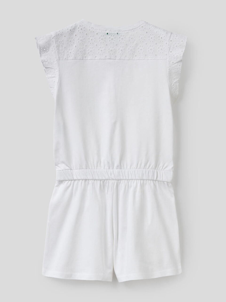 Jumpsuit with inserts in perforated fabric image number 2