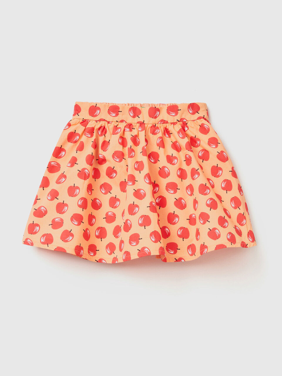 Pink skirt with apple pattern