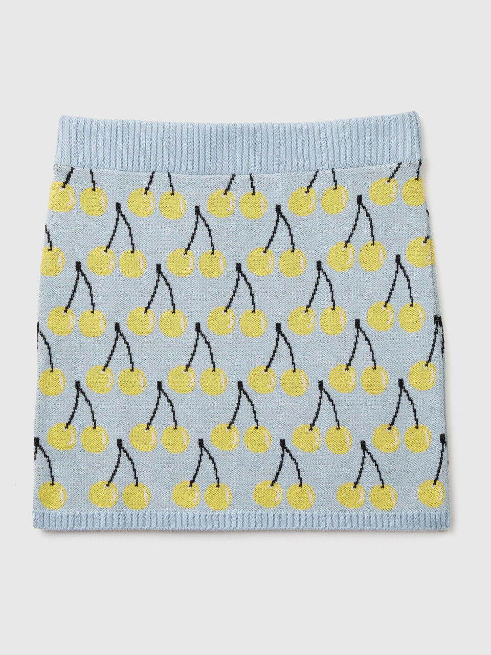 Sky blue mini skirt with cherry pattern