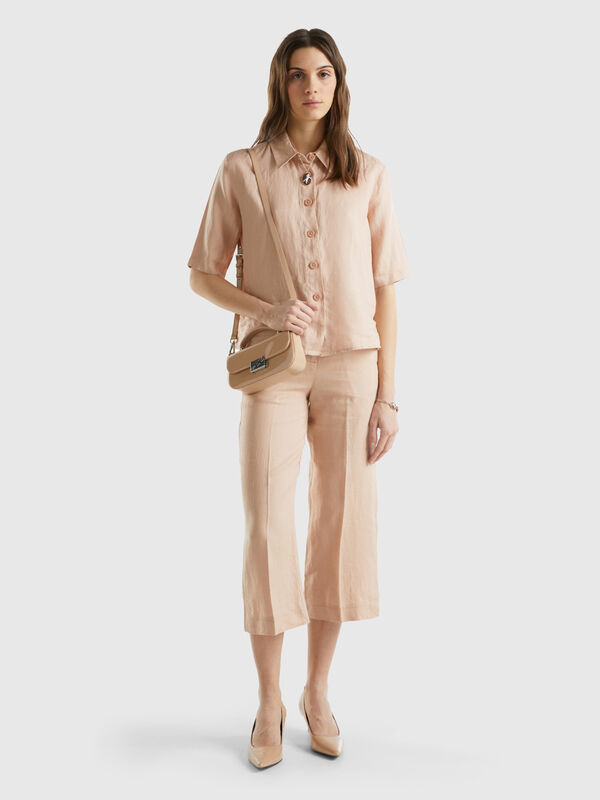 Cropped trousers in pure linen Women
