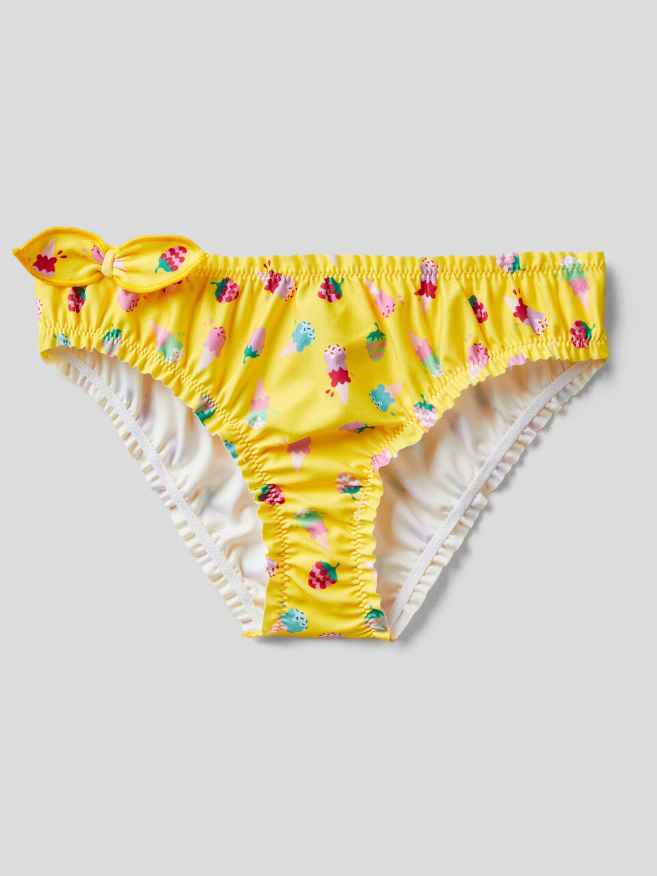 Patterned swim bottoms with bows image number 1