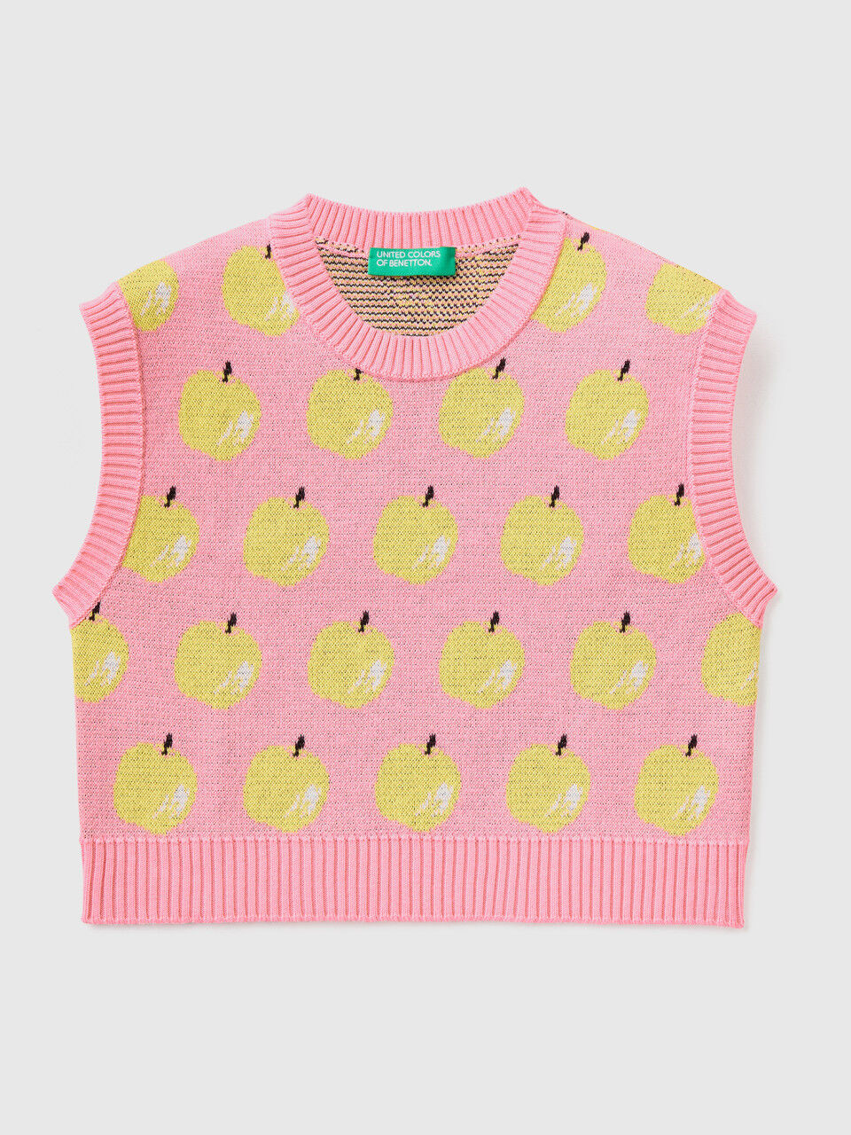 Pink vest with apple pattern