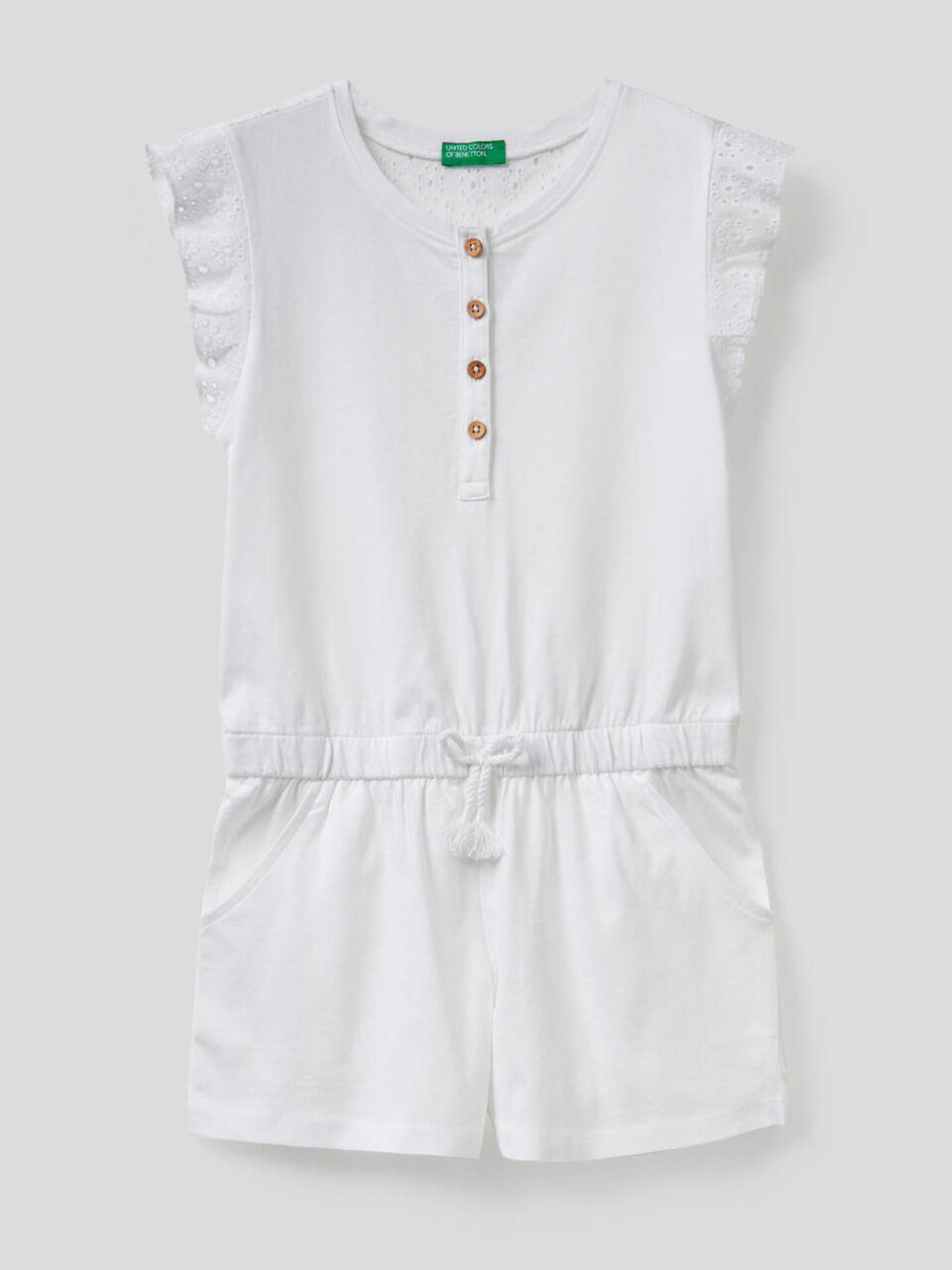 Jumpsuit with inserts in perforated fabric image number 1