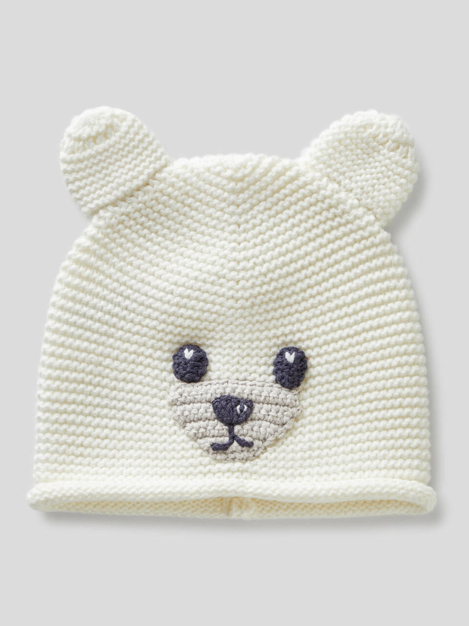Tricot hat with applique image number 1