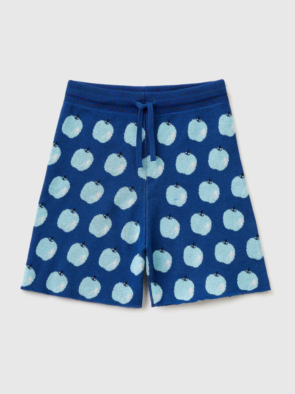Blue bermudas with apple pattern