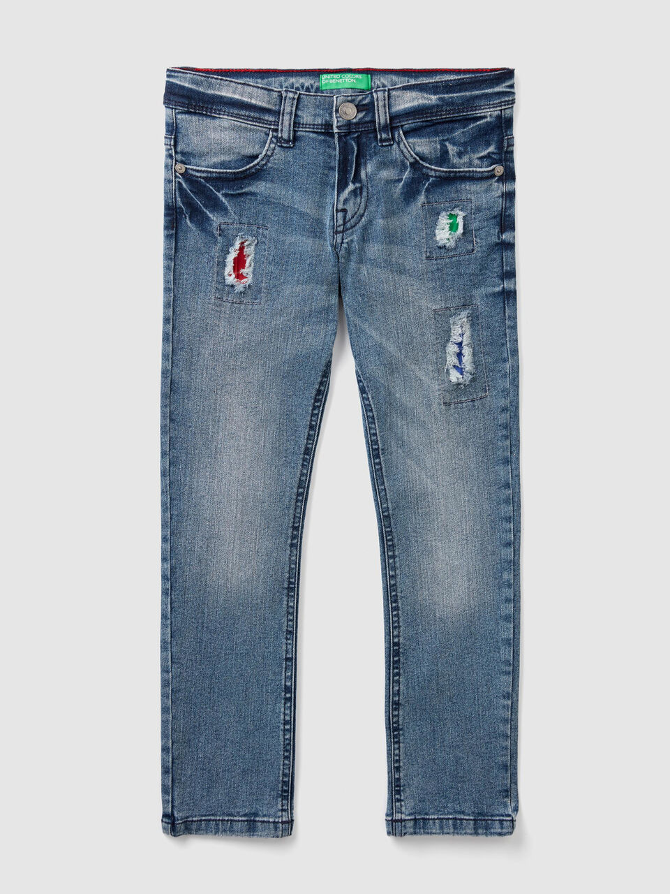 Slim fit jeans with colorful patches image number 1